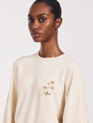 earth day sweatshirt in cream 1