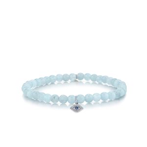 white gold bezel diamond eye with sapphire on aquamarine 1